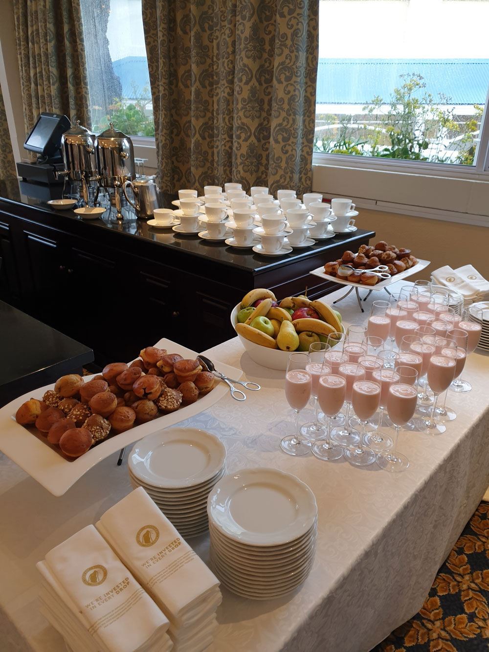 Food and drinks displayed for conference.