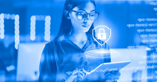 Young female with glasses looking at secure digital credentials from Advanced Secure Technologies on a tablet device